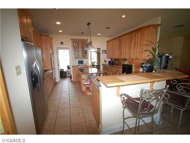 Kitchen - Gourmet Kitchen with Butcher Block Overh