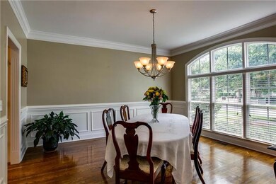 Formal dining room with beautiful windows