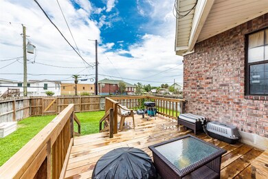 The deck overlooking the large backyard