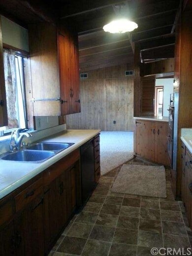 Galley Kitchen with lots of cabinets for plenty of