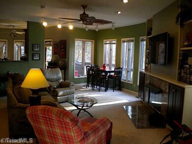 Den/Family/Great Room. Great room with fireplace.  50 inch flat screen with surround sound to remain.