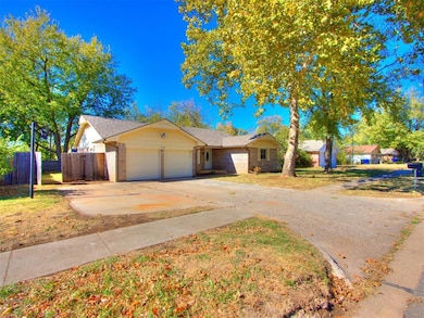Single story home with a garage