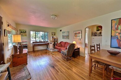 Living Room and Dining Room combined  with arched 