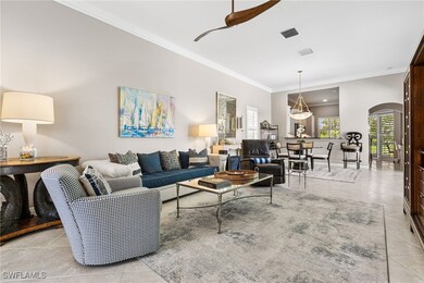 The living and dining area flow seamlessly. Pass t