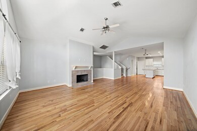 Open concept living space with high ceilings and p