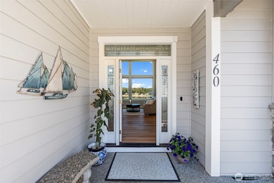 The towering wall of windows brings the outside to your doorstep