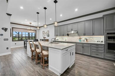 Kitchen with a center island with sink, decorative