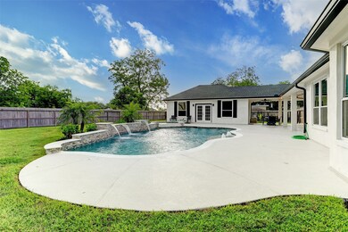 The perfect getaway awaits in your own backyard. Step outside to your own private resort where a sparkling, heated pool and lush lawn awaits you. This remarkable outdoor living area allows for an extraordinary entertainment experience with family and friends.