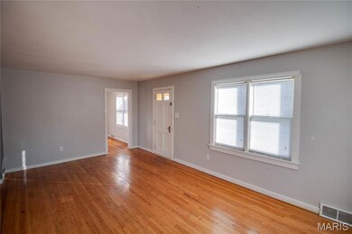 Foyer entrance featuring baseboards and light wood-style floors