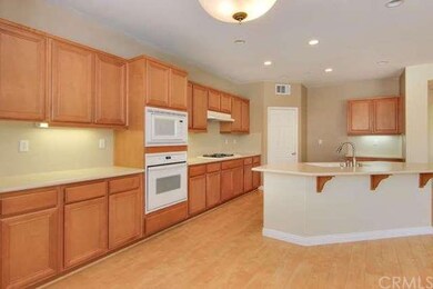 Gourmet Kitchen.  Plenty of Cabinets! Large Center