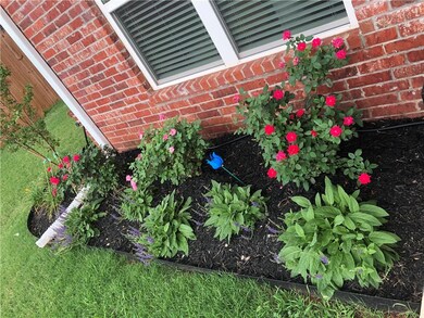Glimpse of flower beds in bloom
