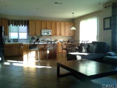 Open view from family room to kitchen