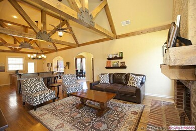 Spacious Great Room includes rich hardwoods, arche