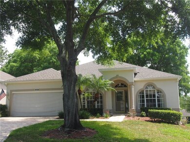 Front of home with garage screen down