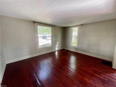 Living room with a healthy amount of sunlight and 