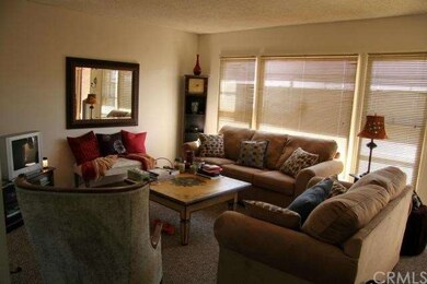 Living Room Rear Unit.  Tenant Occupied.  
