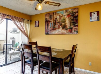 Dining area with sliders to private patio