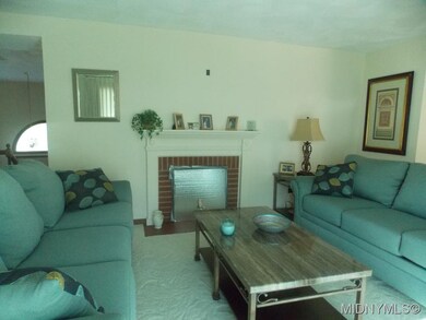 Formal livingroom w- fireplace