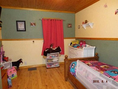 Bedroom. 2nd Bedroom has Pergo Flooring .