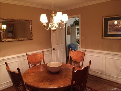 Formal Dining Room with Wood Floors. Opens to Kitc