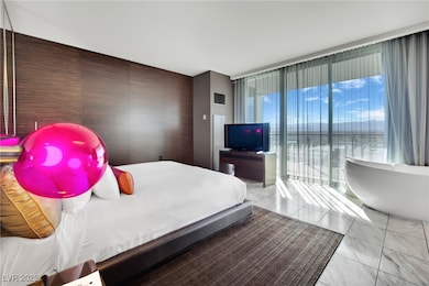 Bedroom with expansive windows