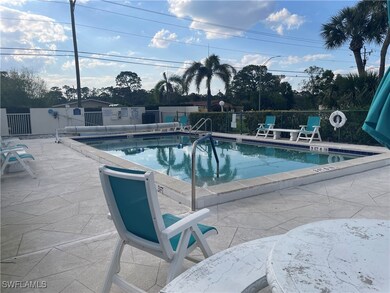 Pool featuring a patio area and fence