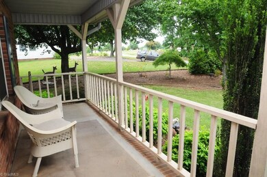 View of side lawn from large front porch.