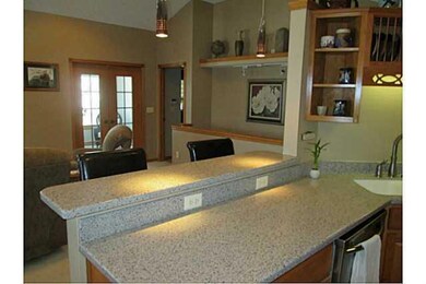 Kitchen. View of family room from kitchen.