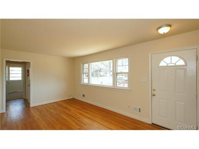 Living Room - The formal Living Room boasts hardwo