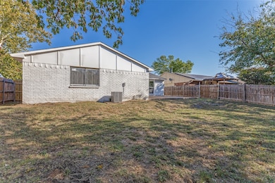 View of fenced backyard