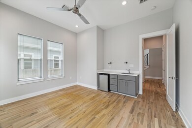 Downstairs room with kitchenette and outdoor acces