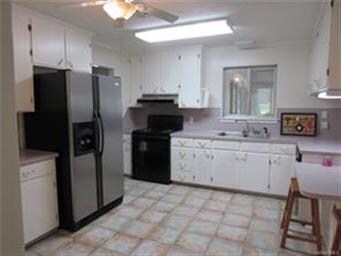 Looking into the kitchen from the dining room.