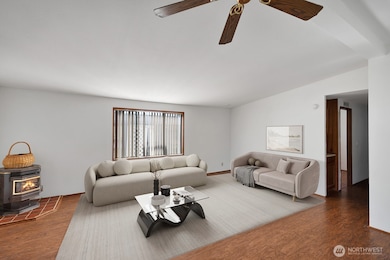 Another view of the large living room area. This room will easily accommodate, sofa, love seat, recliners, Big Screen TV and more.