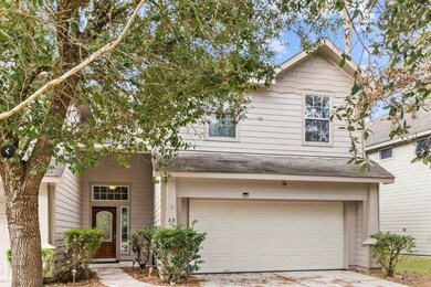 Charming two-story home with an inviting front ent