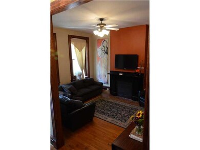 Living Room. New, Wood Energy Efficient Windows in