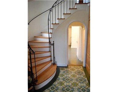 Entry/Foyer. Custom designed, gracefully curved oa