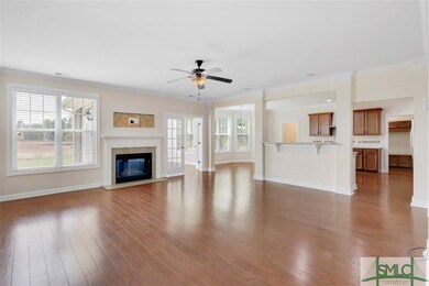 Living room with added fireplace and sunroom and v
