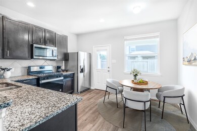 This digitally staged dining area highlights the r