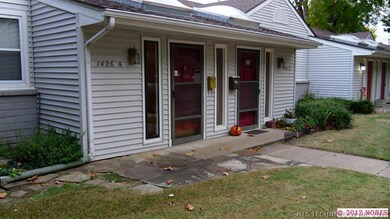 Another view of front with flagstone rock