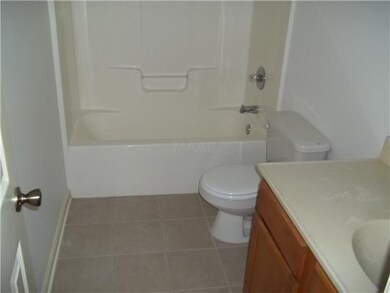 Hall bath with fresh paint & new ceramic tile floo
