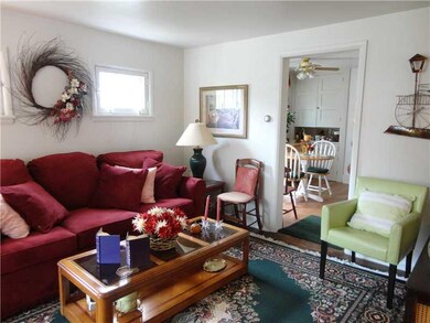 Living Room. High rectangular privacy windows in b