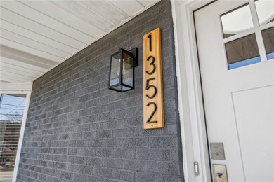 The custom-made address plaque is the first of man