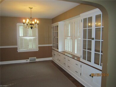 DINING AREA WITH BUILT IN CABINETS.