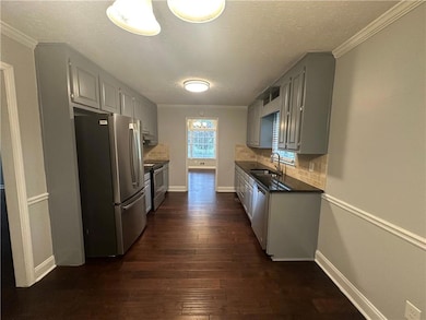 Kitchen with appliances with stainless steel finis