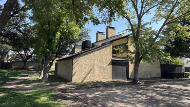 View of home's exterior with a lawn