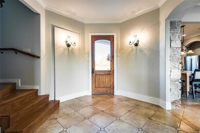 Step inside to the grand entry. The left of the front door is an unfinished closet space that was intended for an elevator shaft, if you choose to install one.