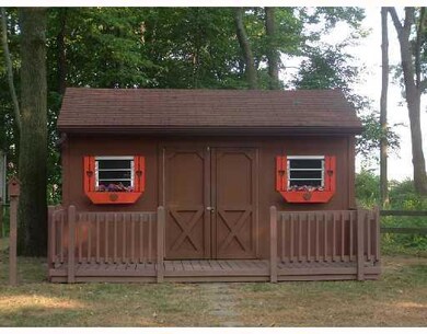 Exterior Front. Darling shed to match ex