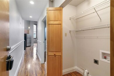 Walking in the front door, notice the laundry room