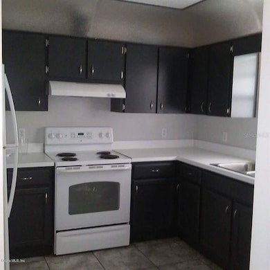 21411 SW Honeysuckle St, Dunnellon, FL 34431 - photo 4