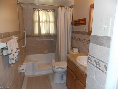 Beautiful updated bathroom. Ceramic tile.